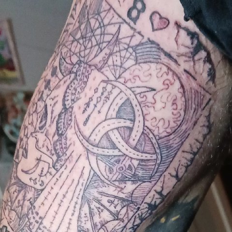 Explore floral tattoo cover up ideas, creative tattoo ideas in San Antonio, available at Its Live Through This Tattoos, Supplies, & Piercings