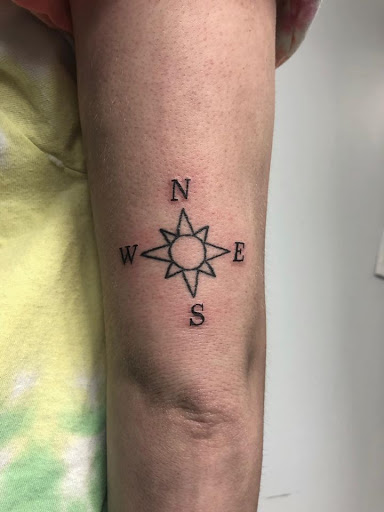 Explore name tattoo ideas on neck, creative tattoo ideas in Oxford, available at Victorian Ink