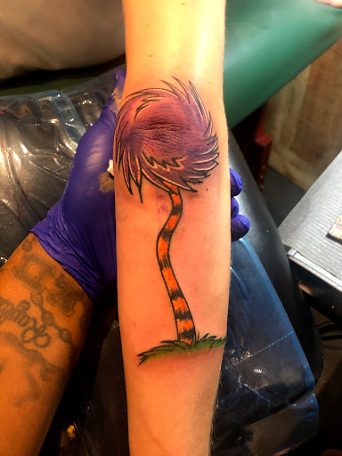 Explore eagle feather tattoo ideas, creative tattoo ideas in Cape Coral, available at UNRIVALED INK