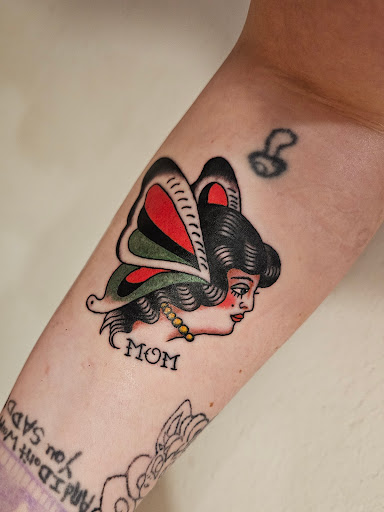 Explore female neck tattoo ideas, creative tattoo ideas in Coeur D Alene, available at Northwest Tattoo Museum & Tattooing