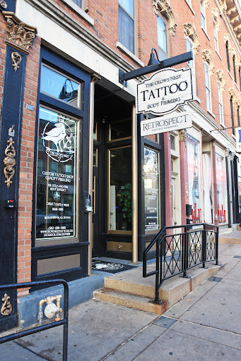 Explore trap tattoo ideas, creative tattoo ideas in Dubuque, available at The Crows Nest