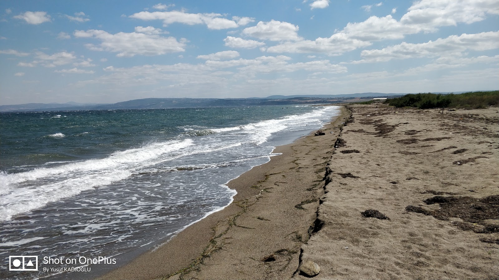 Foto de Kumkale beache com água cristalina superfície