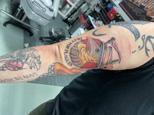 Explore wedding band tattoo ideas for him, creative tattoo ideas in Youngsville, available at Inkophilia