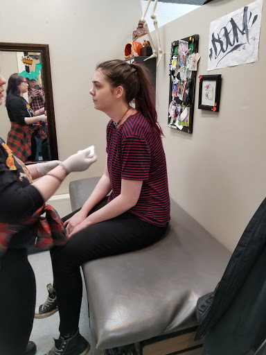 Explore tree tattoo ideas for females, creative tattoo ideas in Anchorage, available at Body Piercing Unlimited