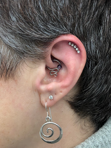 Explore climbing tattoo ideas, creative tattoo ideas in Northampton, available at Haven Body Arts Piercing & Tattoo