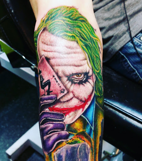 Explore muscle tattoo ideas, creative tattoo ideas in Buffalo, available at Madd Ink Tattoo & Piercing