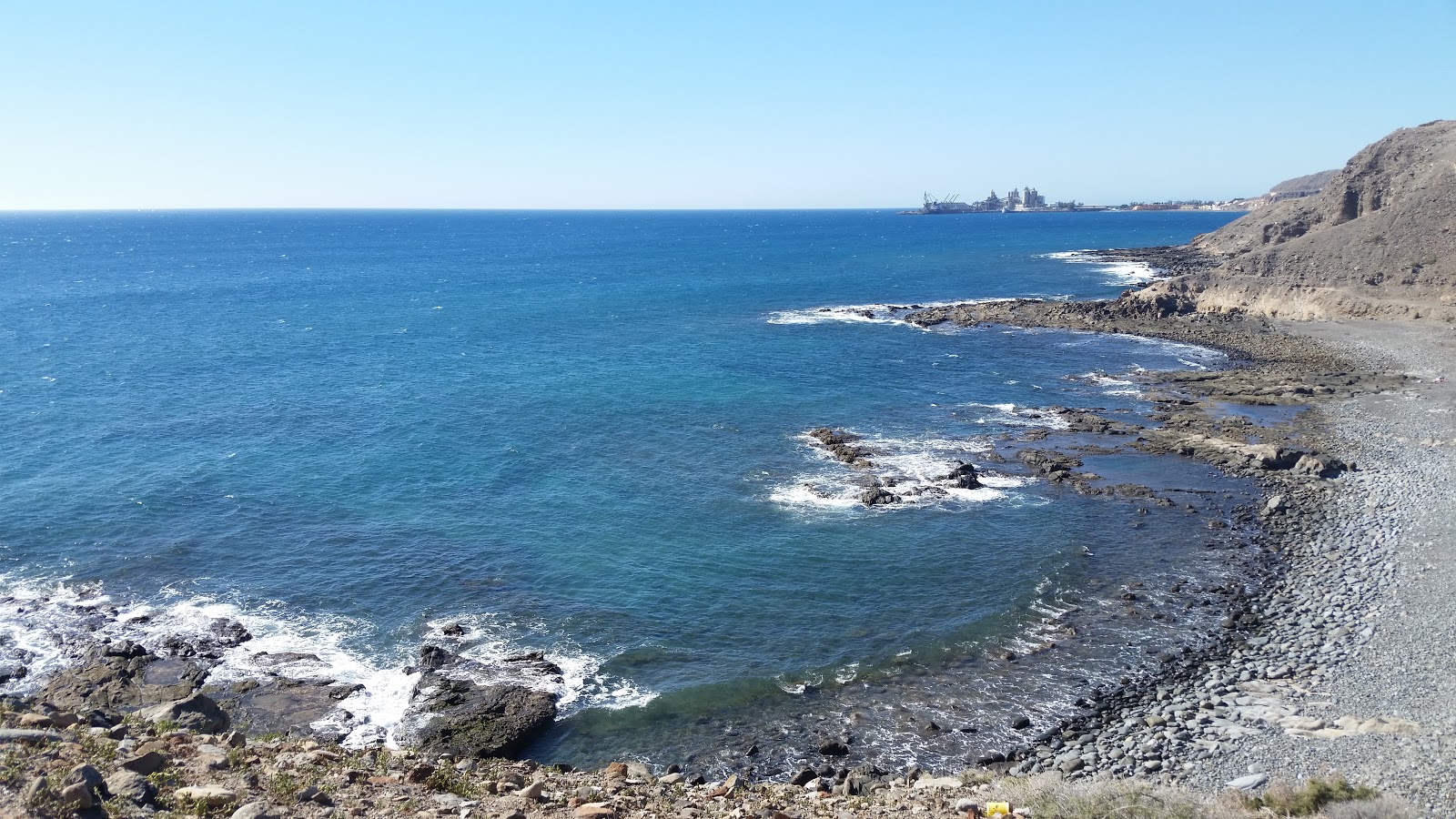 Foto di Playa Las Carpinteras con una superficie del ciottolame