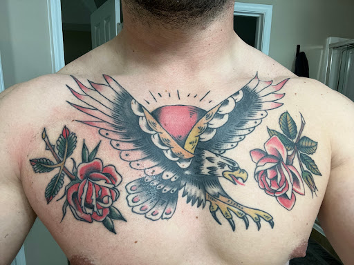 Explore ideas for chest tattoos men, creative tattoo ideas in Atlanta, available at Big Cat Tattoo