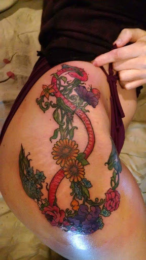 Find breast tattoo ideas for females for your next unique tattoo in Milan at Apocalyptic Ink Studio