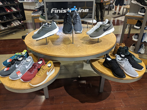 Stores to buy women's guess sneakers Orlando