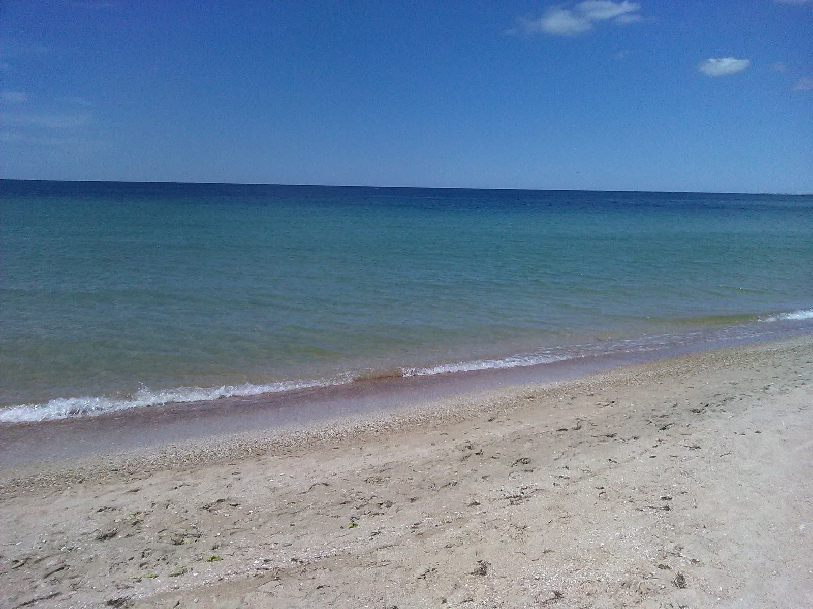 Photo of Zaozernoe beach III with turquoise pure water surface