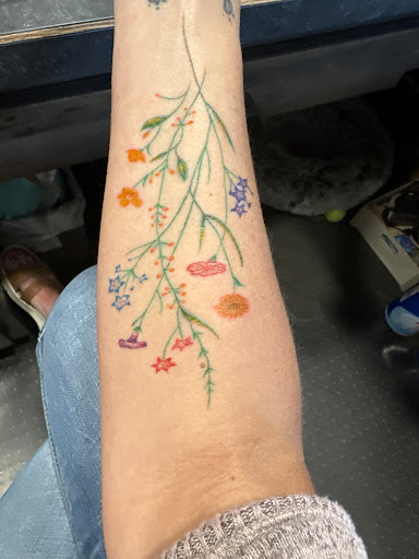 Explore unique tramp stamp tattoo ideas, creative tattoo ideas in San Diego, available at Above All Tattoo - Pacific Beach