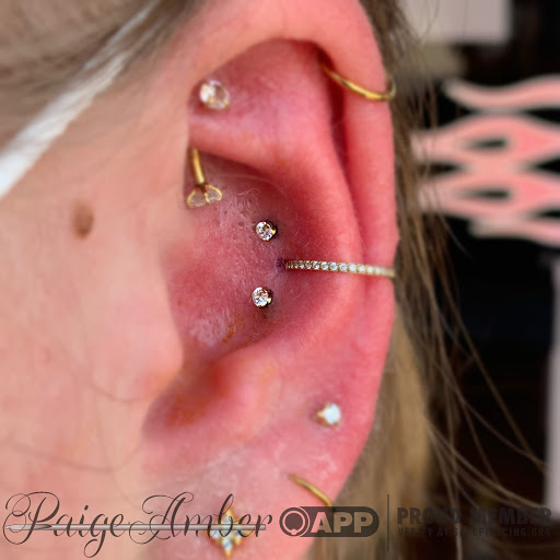 Explore paw print tattoo ideas, creative tattoo ideas in Oshkosh, available at Piercings by Paige at Big Guns Tattoo