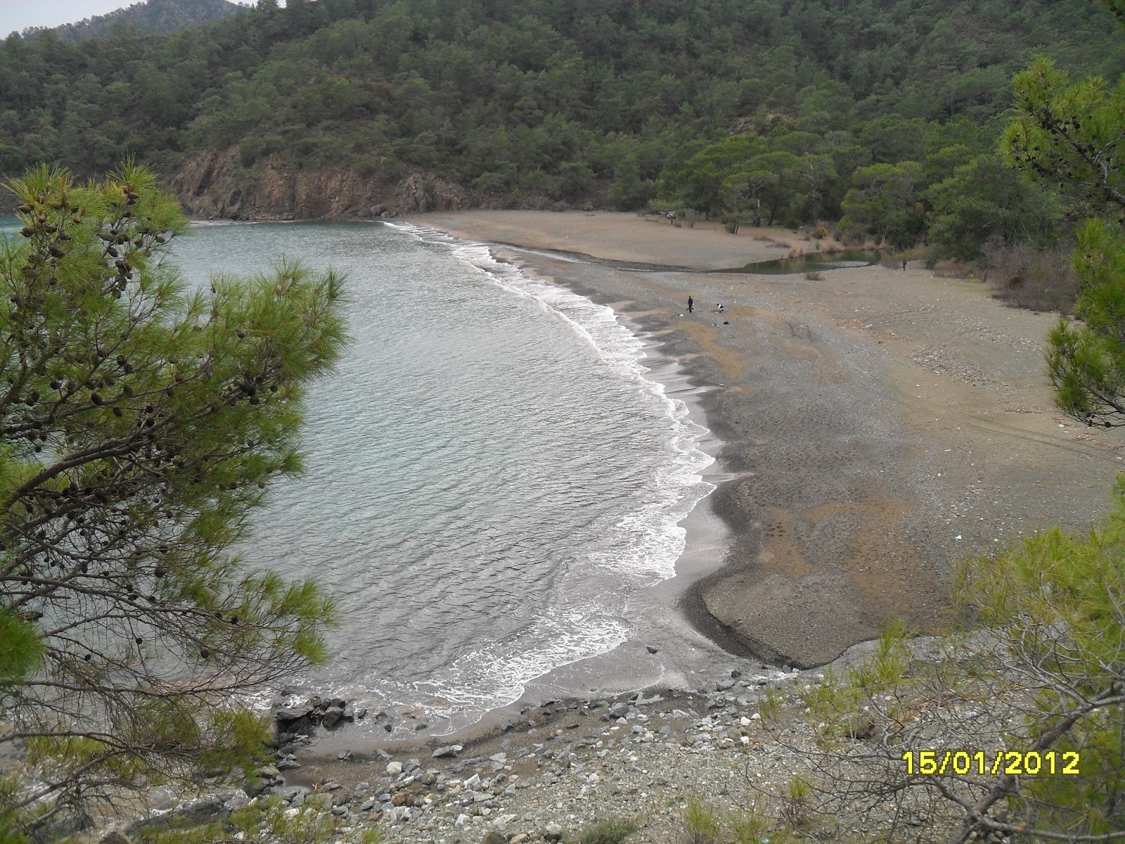 Fotografie cu Tekirova Beach II cu o suprafață de nisip negru și pietricel