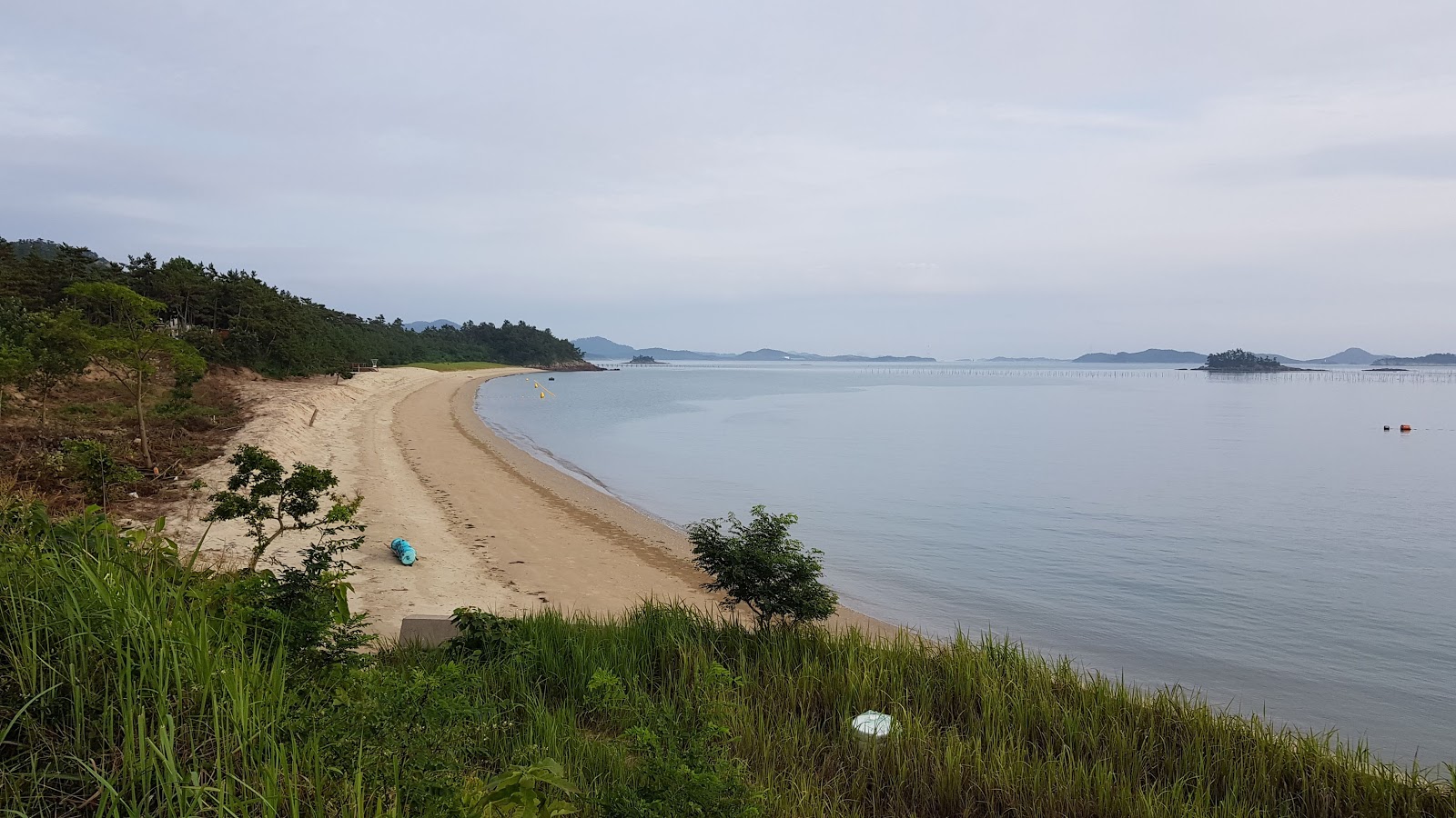 Fotografija Chupo Beach in naselje