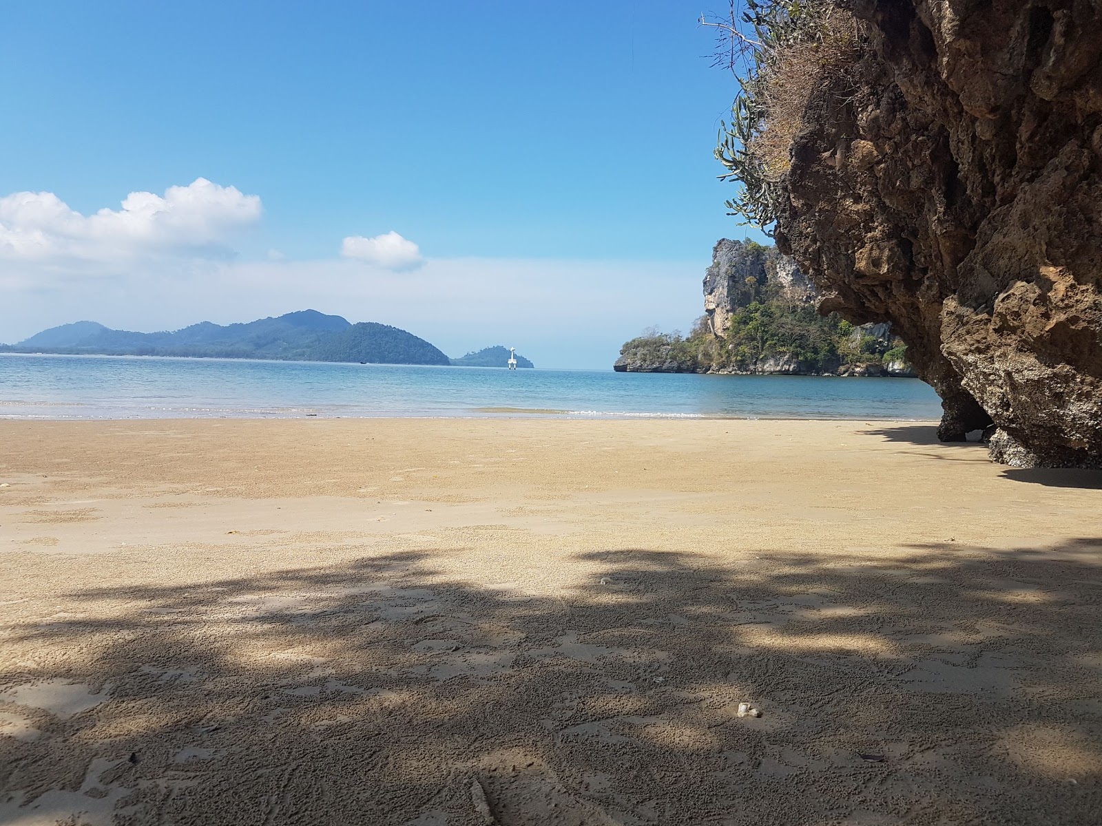 Photo of Chao Mai Beach with turquoise pure water surface