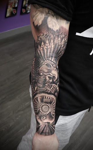 Explore unique sleeve tattoo ideas for females, creative tattoo ideas in Mesa, available at Smiley Ink Tattoos