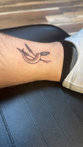 Explore behind ear tattoo ideas for guys, creative tattoo ideas in Biloxi, available at Artisan Ink Studio