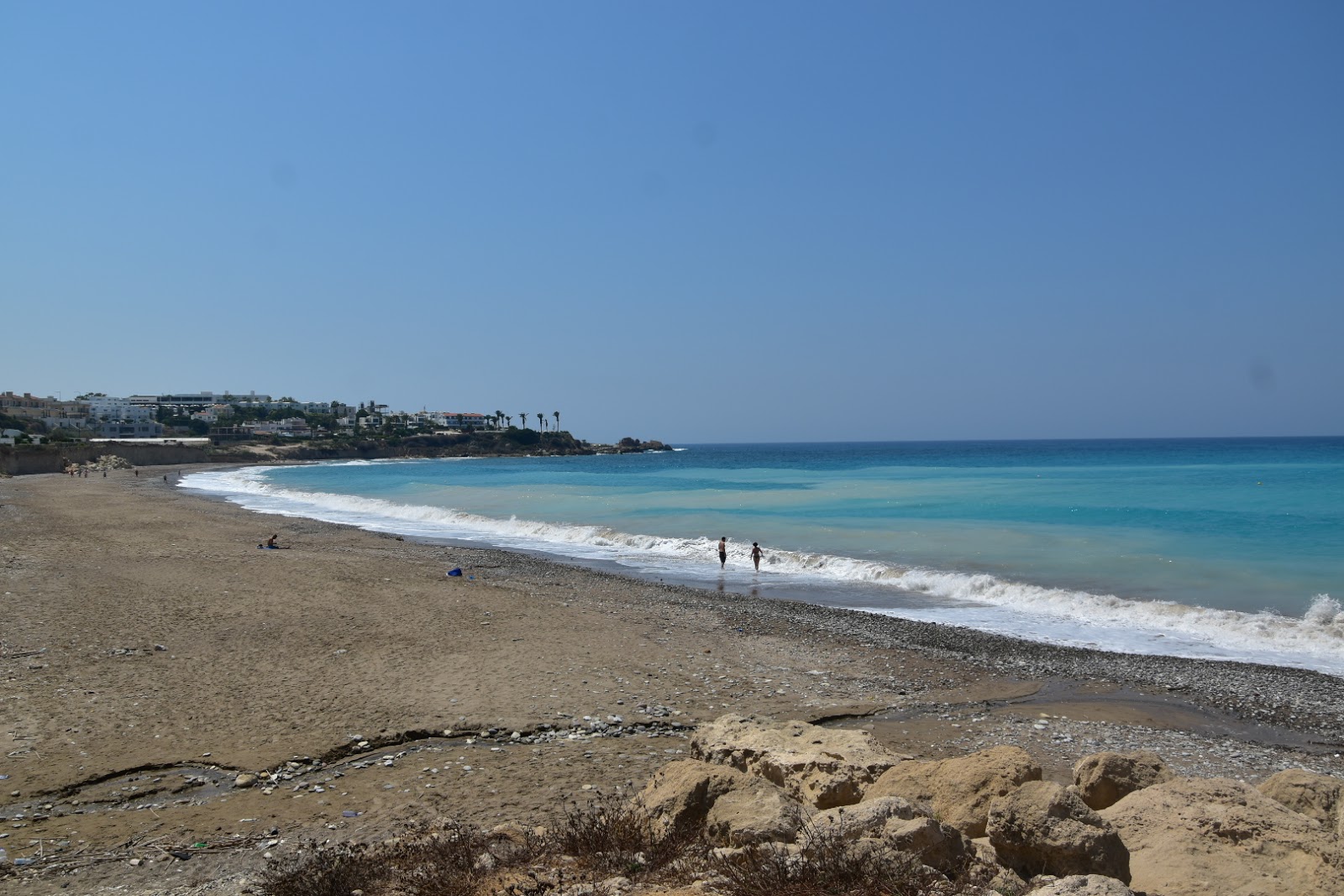 Foto av Potima beach med turkosa vatten yta