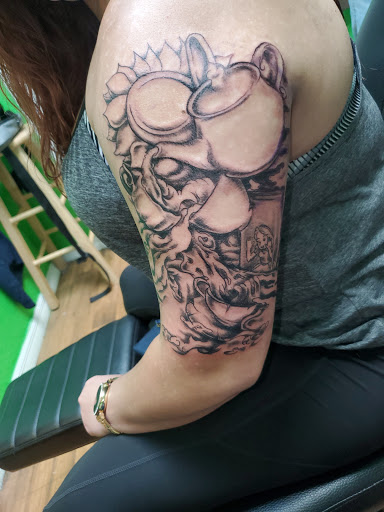 Find playboy bunny tattoo ideas for your next unique tattoo in Ocala at Lucky Bucks Tattoo Piercing Studio (APPT BASED)