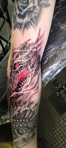 Explore female hand tattoo ideas, creative tattoo ideas in Angola, available at Hoodlum Ink