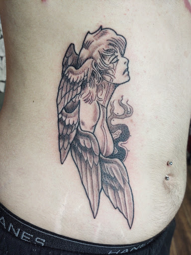 Explore infinity tattoo cover up ideas, creative tattoo ideas in Grand Forks, available at Branded Man Tattoo