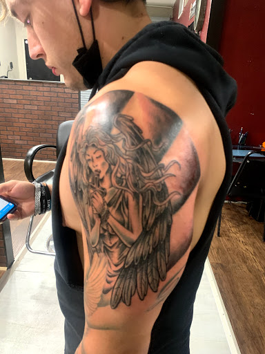 Explore godson tattoo ideas, creative tattoo ideas in Cape Coral, available at UNRIVALED INK