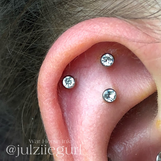 Explore hood neck tattoos ideas, creative tattoo ideas in Kent, available at War Horse Ink