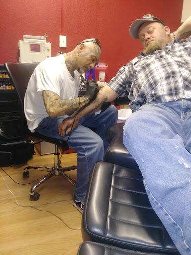 Tattoo Shop «West Coast Tattoos», reviews and photos, 719 E Tennessee St, Florence, AL 35630, USA