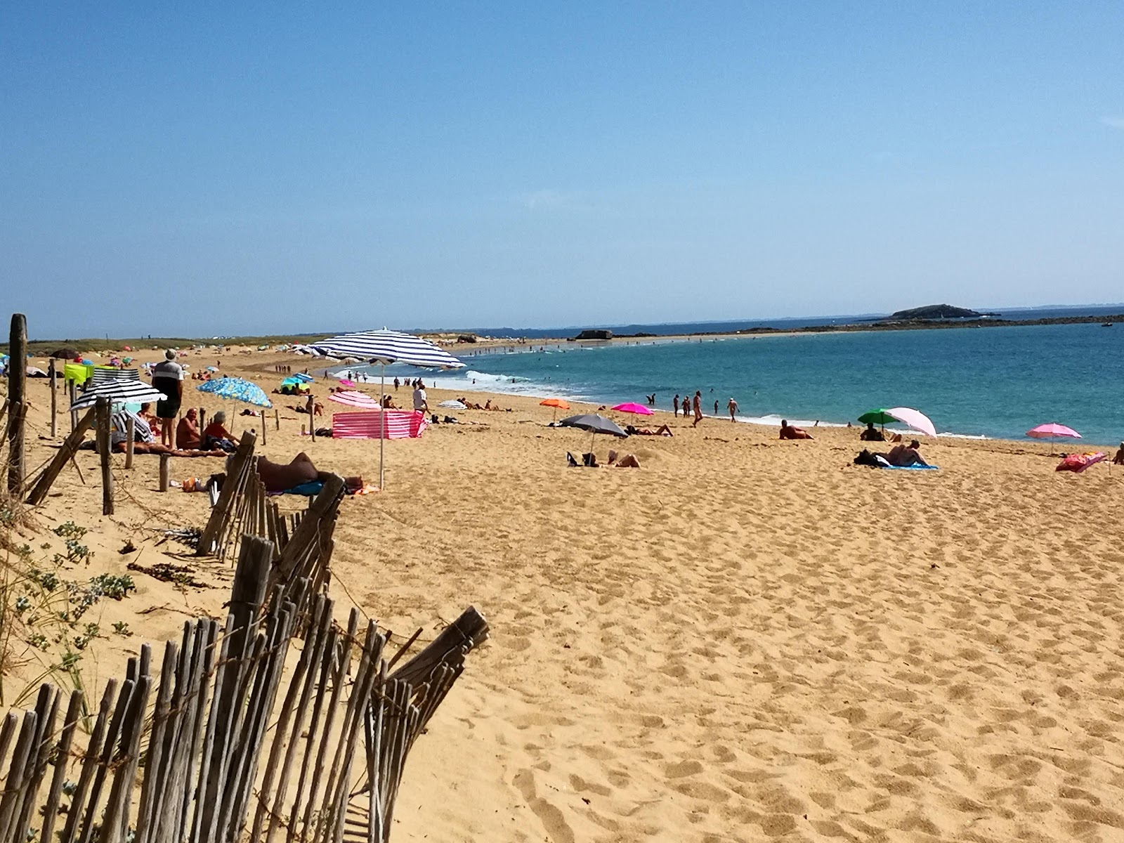 Foto van Plage de Kerminihy met recht en lang