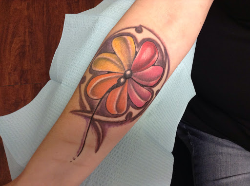 Explore haitian tattoo ideas, creative tattoo ideas in Seymour, available at American Gypsy Tattoo Corp.