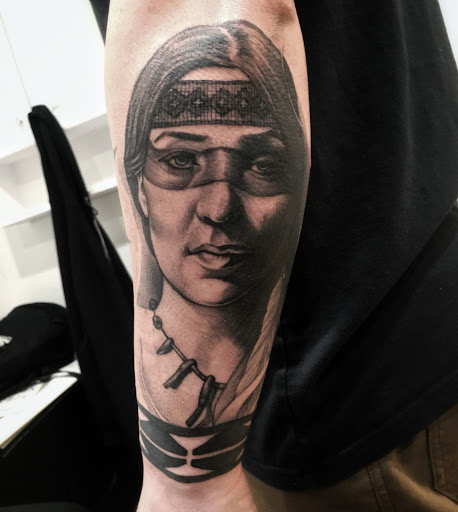 Explore family tree tattoo ideas for guys, creative tattoo ideas in Magnolia, available at Mr. Grays Tattoo Studio