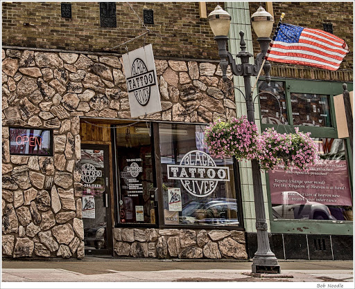 Explore simple dark tattoo ideas, creative tattoo ideas in Black River Falls, available at Black River Tattoo