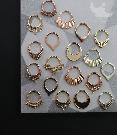 Explore gift ideas for tattoo artists, creative tattoo ideas in Syracuse, available at Scarab Body Arts