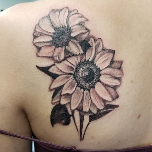 Explore cupid tattoo ideas, creative tattoo ideas in Roscoe, available at Elevated Ink Tattoo