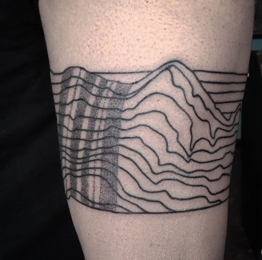 Explore cherry tattoo ideas, creative tattoo ideas in San Diego, available at Sideshow Tattoo and Piercing