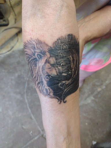 Explore male forearm tattoos ideas, creative tattoo ideas in Milford, available at Forsaken Ink Tattoos