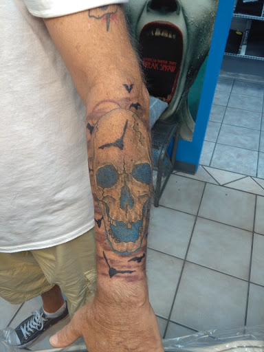 Explore big cover up tattoo ideas, creative tattoo ideas in Bradenton, available at Memory Lane Tattoo Co.