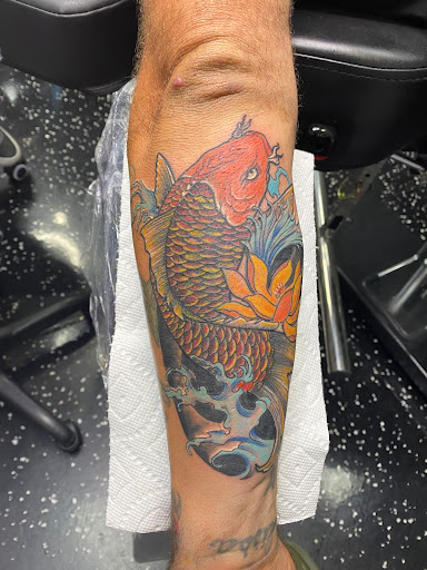 Explore motherhood tattoo ideas, creative tattoo ideas in Fort Myers, available at Loyal 2 The Coil Tattoos & Piercings (Edison Mall Location Entrance F)