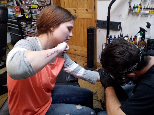 Explore back of the arm tattoo ideas, creative tattoo ideas in Sulphur Springs, available at The Highwaymen USA Ink llc.
