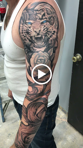 Explore mens tricep tattoo ideas, creative tattoo ideas in Dayton, available at Uppity Tattoos