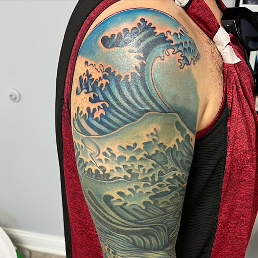 Explore blacked out tattoo ideas, creative tattoo ideas in Kenosha, available at Kenosha Tattoo Company