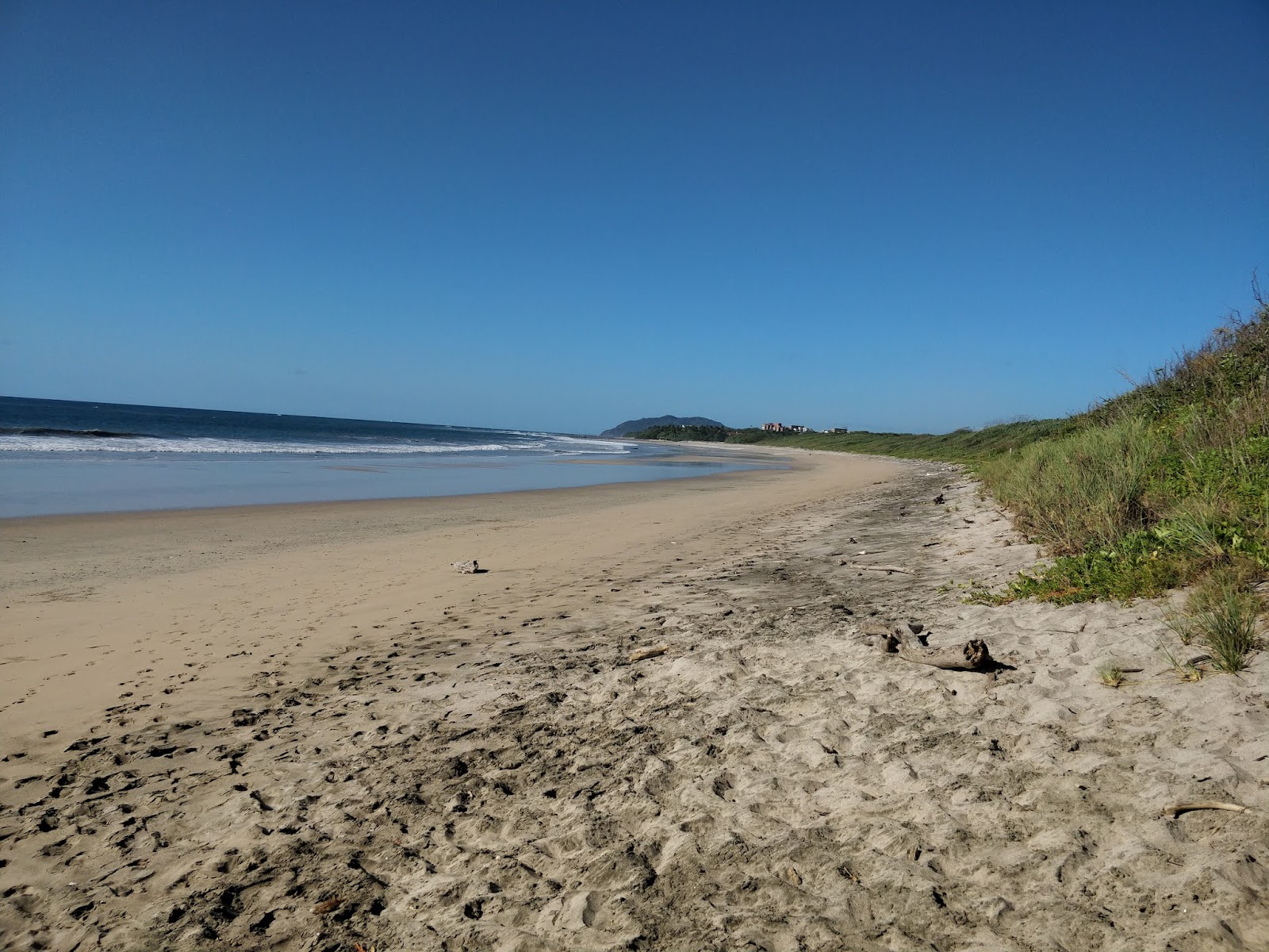 Zdjęcie Langosta Beach z powierzchnią beżowy piasek