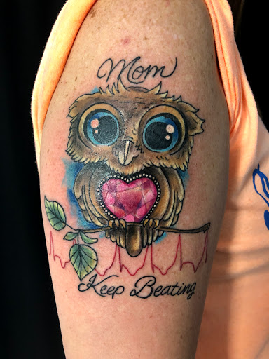 Explore family matching tattoos ideas, creative tattoo ideas in Greenfield, available at Tattoos In Time Studio