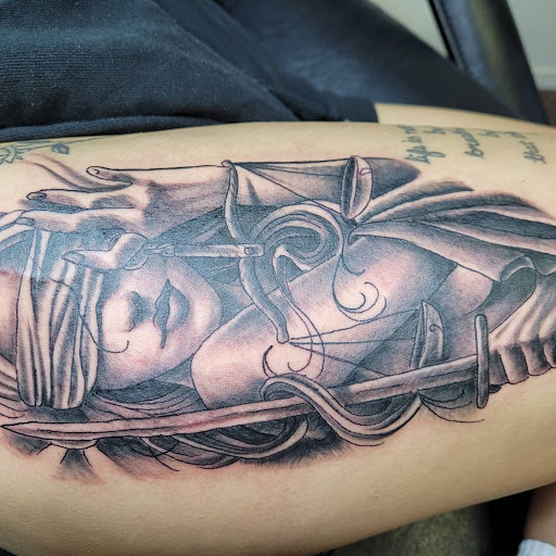 Explore pumpkin tattoo ideas, creative tattoo ideas in Angola, available at Hoodlum Ink