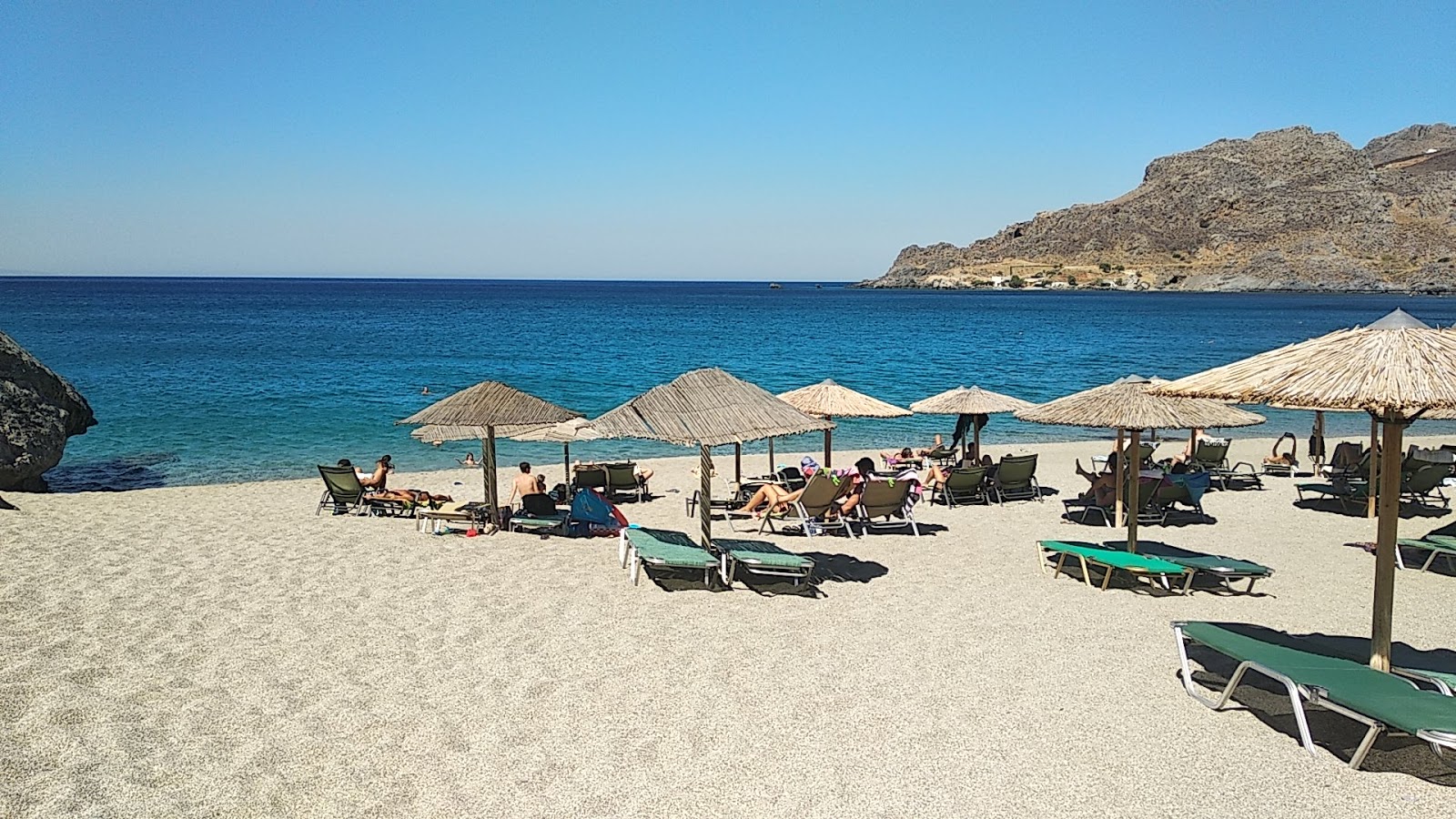 Fotografija Ammoudaki beach in njegova čudovita pokrajina