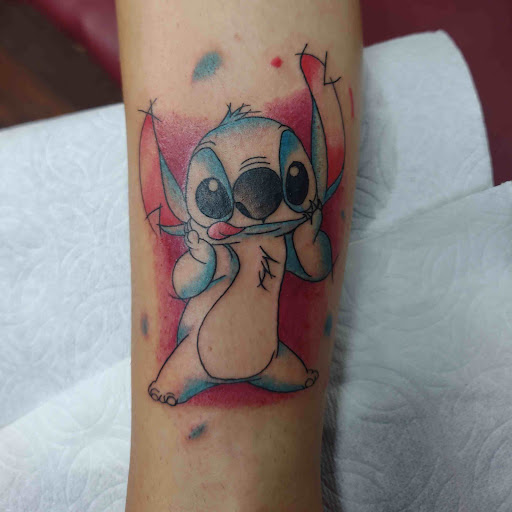 Explore colorful sleeve tattoo ideas, creative tattoo ideas in Lubbock, available at Sinners & Saints Art Company