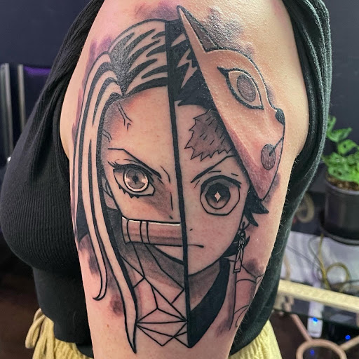 Find underboob tattoo ideas for your next unique tattoo in Logan at Surreal Ink Tattoo & Body Piercing