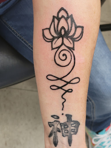 Explore carnage tattoo ideas, creative tattoo ideas in Charlotte, available at Rickys Tattooing