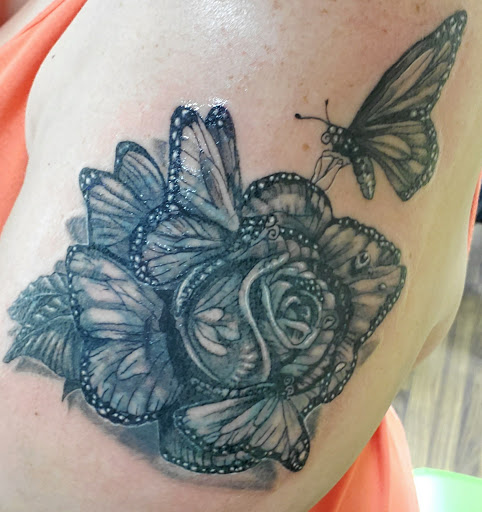 Explore paw tattoo ideas, creative tattoo ideas in Newport, available at Dead On Ta2s